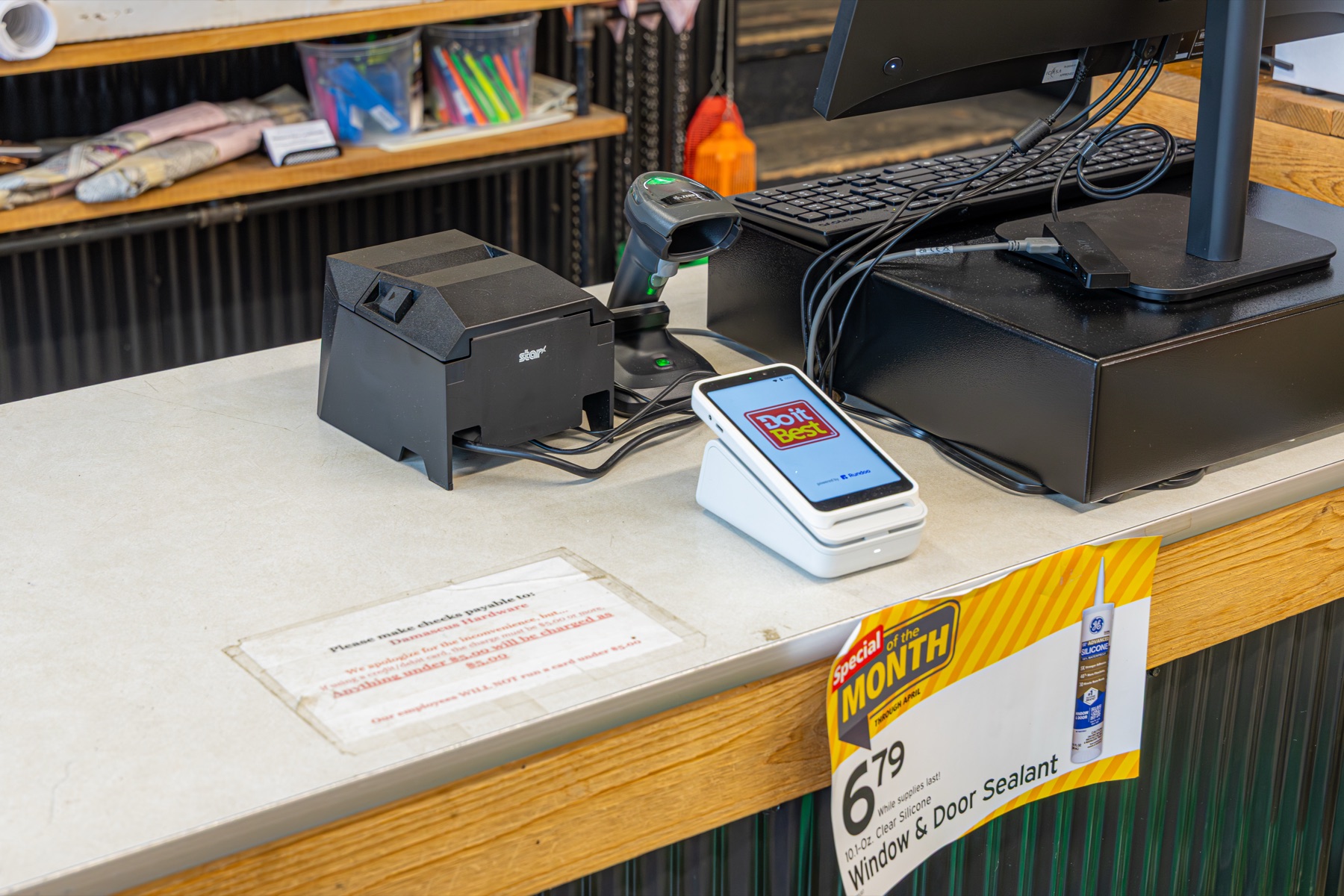 The counter setup — POS, scanner, receipt printer
